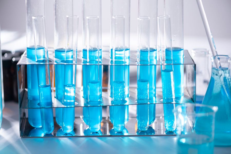 Science lab with test tubes in blue solution